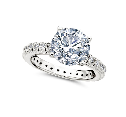 Brilliant Solitaire and Pave Ring in Platinum