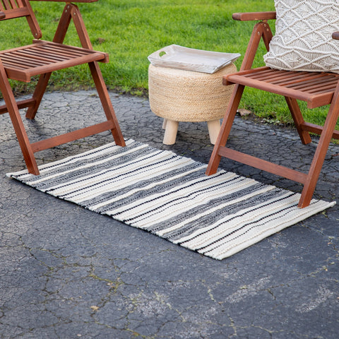 3.5' X 2.25' Cream and Black Twisted Textured Handloom Woven Outdoor Throw Rug
