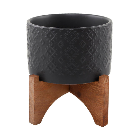 Matte Black Embossed Ceramic Planter On Wood Stand