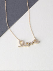 1/6ct TDW Diamond "Love" Pendant in 10k Gold