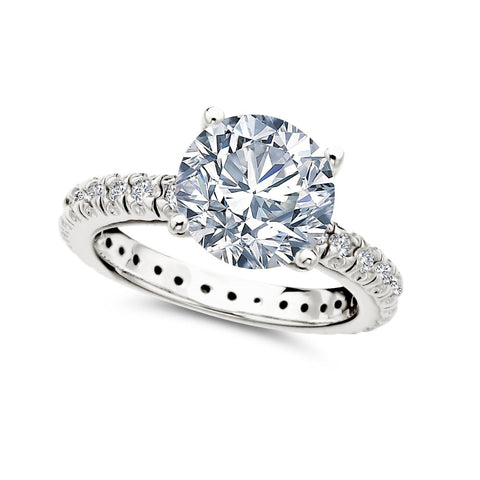 Brilliant Solitaire and Pave Ring in Platinum