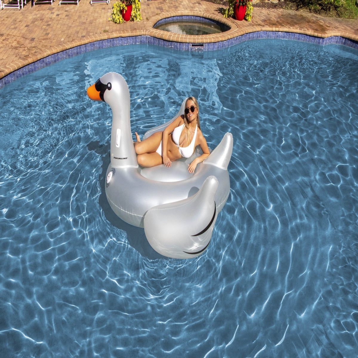  Swim Central Inflatable LED Lighted Color Changing Swimming Pool Ride-on Swan Float Lounger - 75