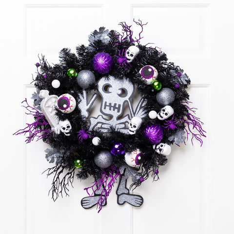 Purple and Black Spooky Skeleton Pine Halloween Wreath  24-Inch  Unlit