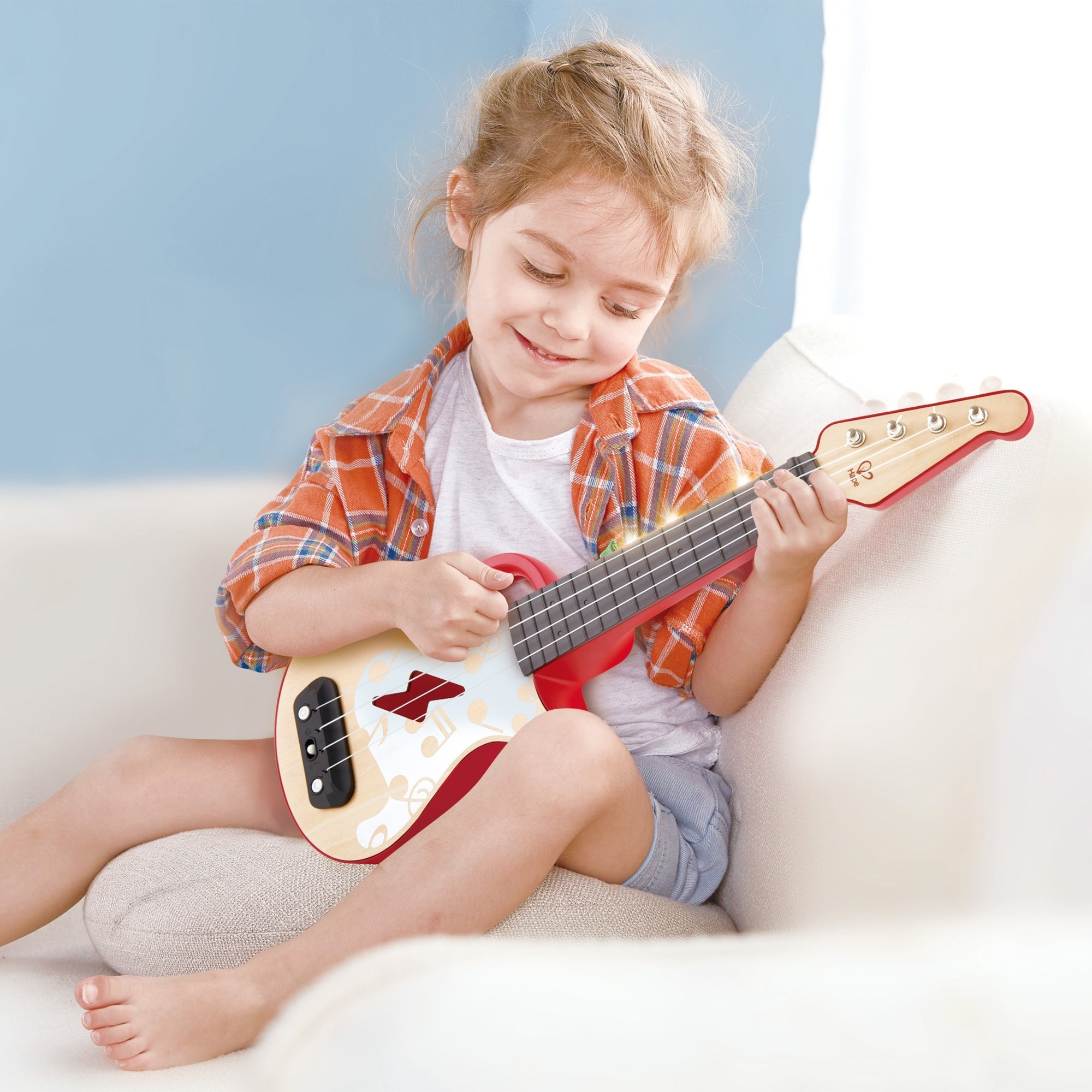  Hape Hape Learn with Lights Toddler Electronic Ukulele in Red, Battery Powered - Multi - Bonton