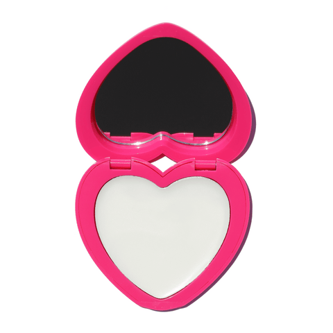Heart-shaped Candy Paint Cream Highlighter compact with a pink and white design, offering a dewy, radiant finish for cheeks, lips, and eyelids.