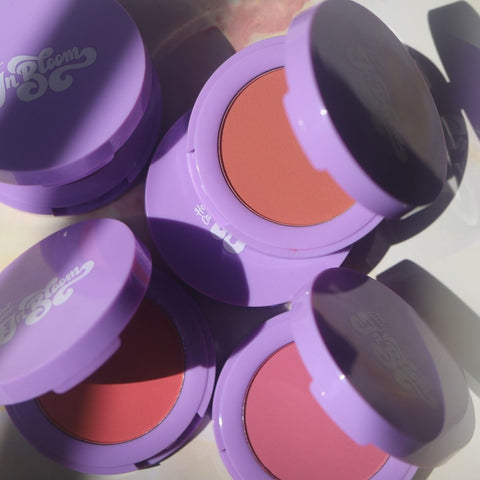 purple compact with pink brown orange pans - In Bloom Powder Blush - Half Caked