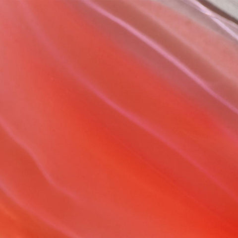 Swatch of sheer orange lip gloss - Instant Crush - 5% Tint - Half Caked