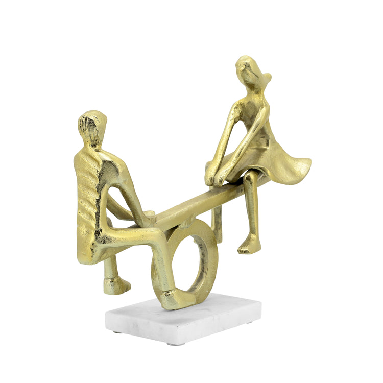 Couple on See-Saw Sculpture