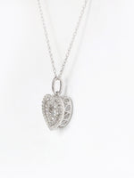 1/5ct TDW Diamond Dual Heart Pendant Necklace in 10k Gold