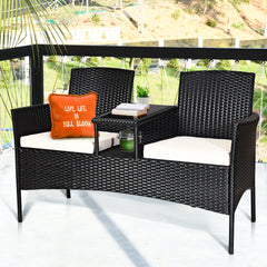 Rattan Cushioned Loveseat with Attached Glass Table