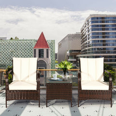 3 Piece Rattan Coffee Table & 2 White Cushioned Chairs